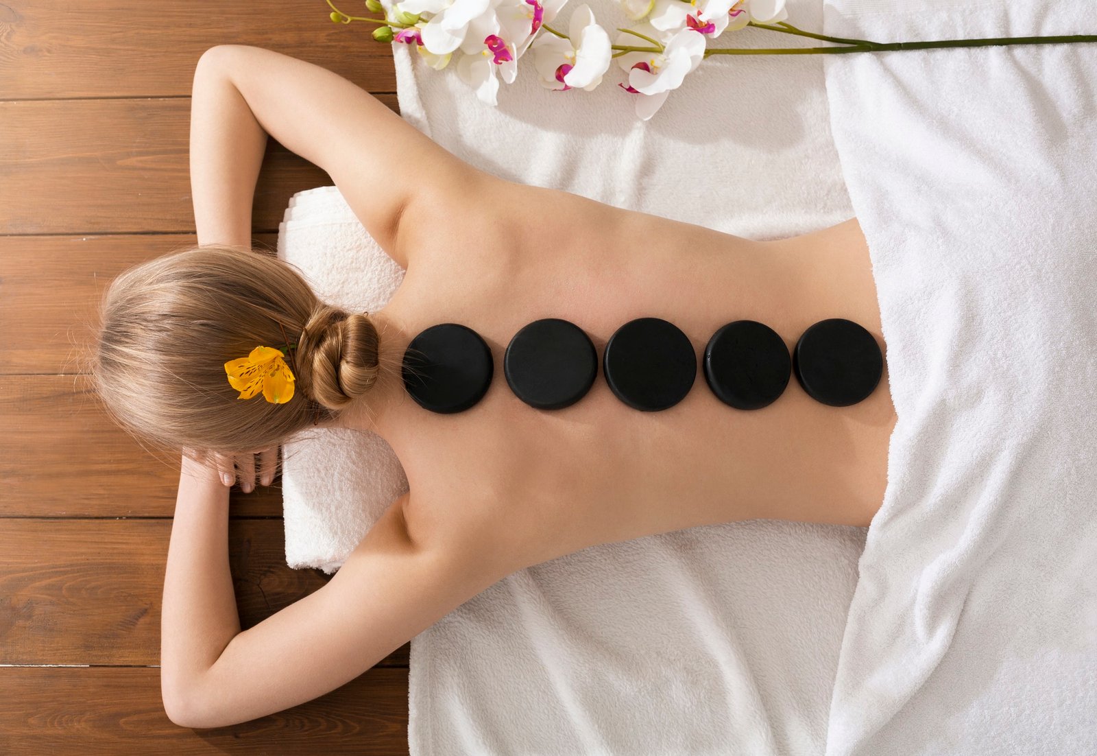 https://allbodykneads.com/wp-content/uploads/2020/04/spa-stone-massage-concept-girl-on-massage-table.jpg